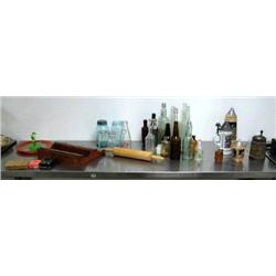Collection of old bottles; steins; playing cards; green fruit jars; depression glass serving platter