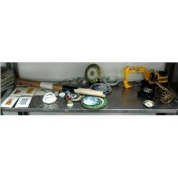 Collection of original water colors; collector's plates; brass cannon; toy Caterpillar loader (2)