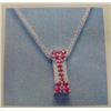 Image 1 : Ruby and diamond Pendant and Chain 18 K white gold- rubies are round, faceted approx. 0.68 carats, t