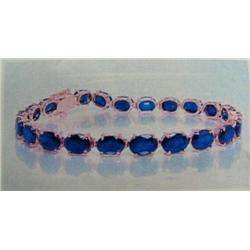 Sapphire Bracelet 14 K yellow gold- sapphires are oval, faceted approx. 20.00 carats, semi-transluce