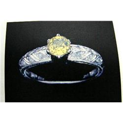 Fine yellow sapphire and diamond Lady's Ring 14 K white gold- sapphire is round, faceted approx. 0.7