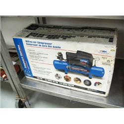 1/2 horse power 3 gallon air compressor, new and in box (84)