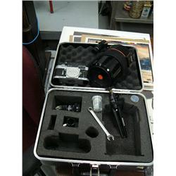 Alpha Reflex camera made in Switzerland model 6C- has lens that is Celestron 8x20 finders scope moun