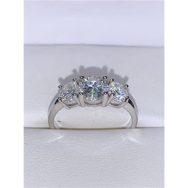 GRA CERTIFIED MOISSANITE VVS D WEIGHING AN ESTIMATED 1.00 CARAT WITH A ROUND CUT MOISSANITE ON EITHE