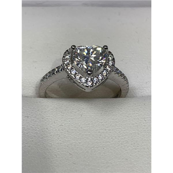 GRA CERTIFIED HEART SHAPED MOISSANITE VVS WEIGHING APPROX. 1.20 CARAT WITH A HEART SHAPED HALO AROUN