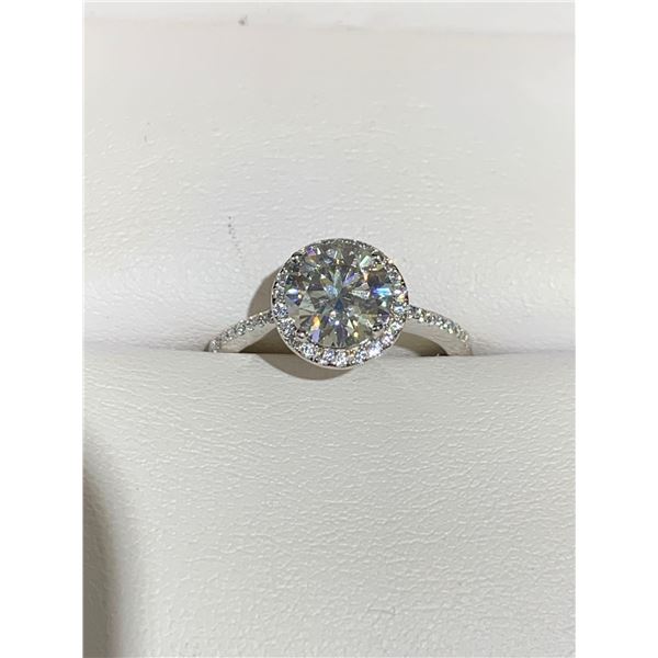 GRA CERTIFIED MOISSANITE VVS LIGHT BLUE IN COLOR WEIGHING APPROX. 2.00 CARAT WITH A HALO SURROUNDING