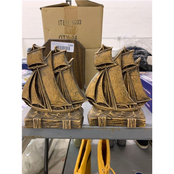 Lot of 2 sail boat statues