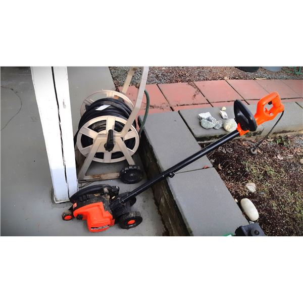 Garden hose holder and edger Cat C