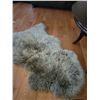 Image 6 : Round Coffee Table and New Zealand Sheepskin Rug Cat A