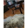 Image 7 : Round Coffee Table and New Zealand Sheepskin Rug Cat A