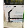 Image 2 : Group of OttLite wellness series wireless charging LED lamp & Koda motion activated LED solar floodl
