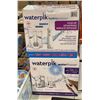 Image 1 : Group of 2 Waterpik water flosser (store return(s))