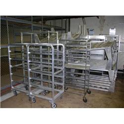 Lot of 10 aluminum risers, 12"H x 48"W x 48"D and 13 rolling racks appox 68" tall, 27" width, length