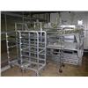 Image 1 : Lot of 10 aluminum risers, 12"H x 48"W x 48"D and 13 rolling racks appox 68" tall, 27" width, length
