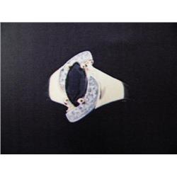 Sapphire and Diamond Lady's Ring 10 K yellow gold- Sapphire is marquise, faceted approx. 0.50 carats