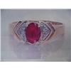 Image 1 : Ruby and Diamond Lady's Ring 10 K yellow gold- ruby is oval, faceted approx. 0.50 carats, color is s