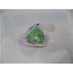 Peridot and Diamond Lady's Ring 10 K yellow gold- peridot is trillion, faceted approx. 1.50 carats; 