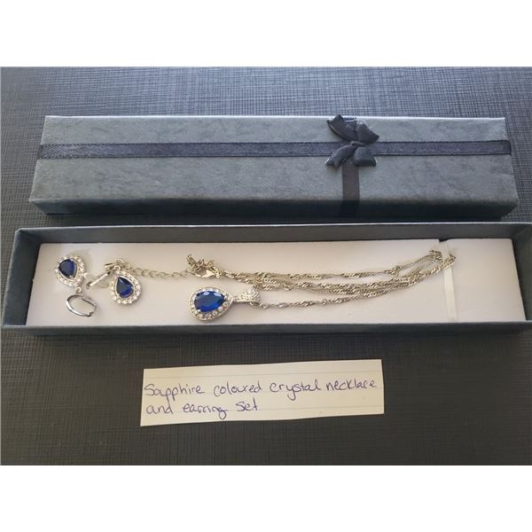 UNRESERVED Sapphire colored crystal necklace and earrings set