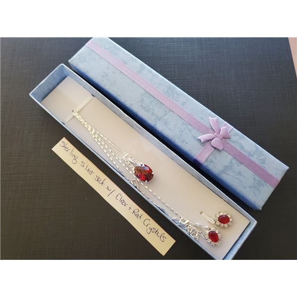 UNRESERVED Still serving silver set with clear and red crystals