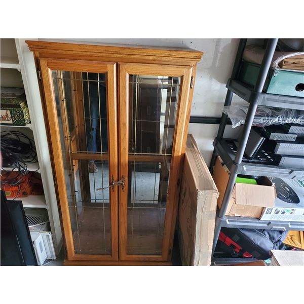 Tall glass cabinet With wooden shelves