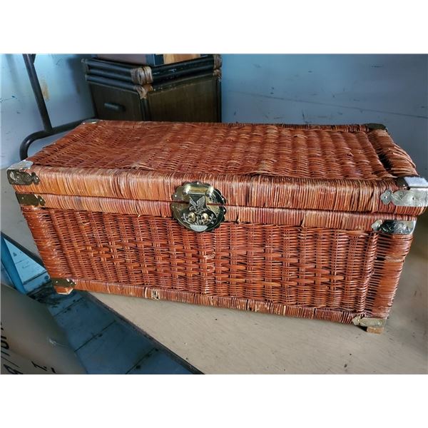 Woven wicket chest with brass accents
