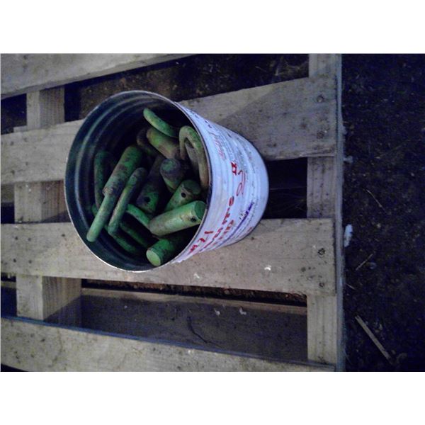 Pail of assorted pins