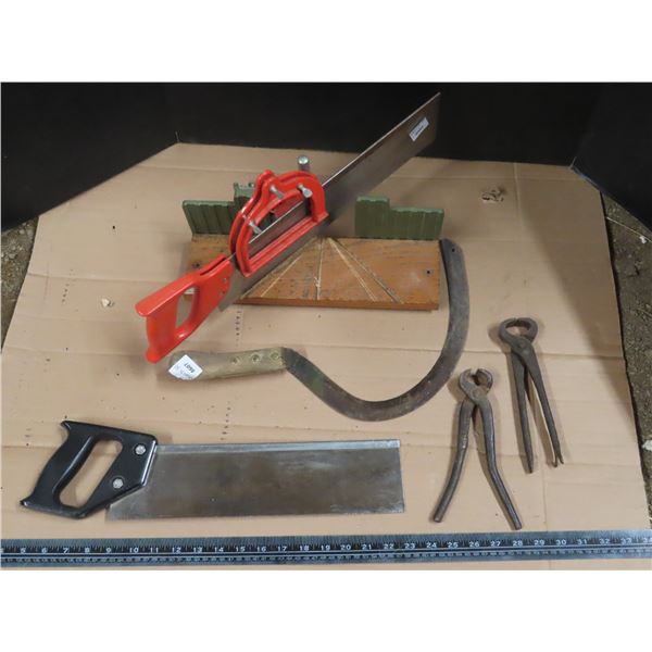fencing nail pullers , scythe , mitre saw with extra saw