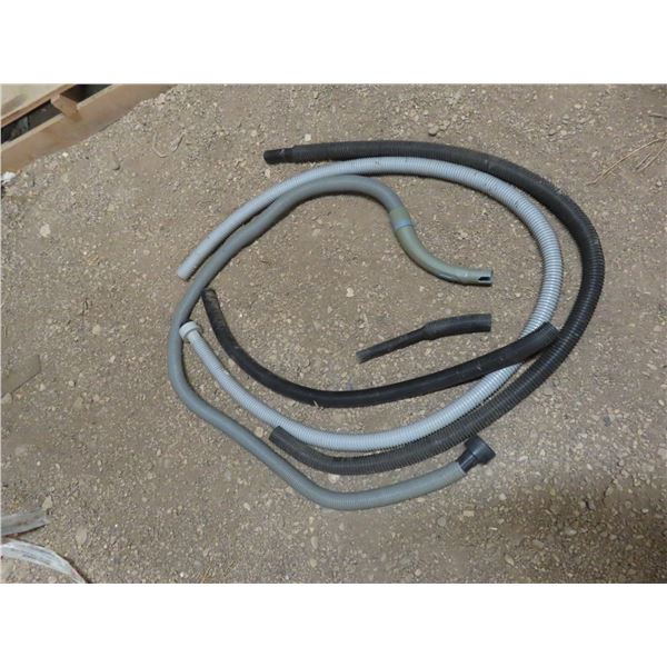lot of assorted vacuum shop vac hoses