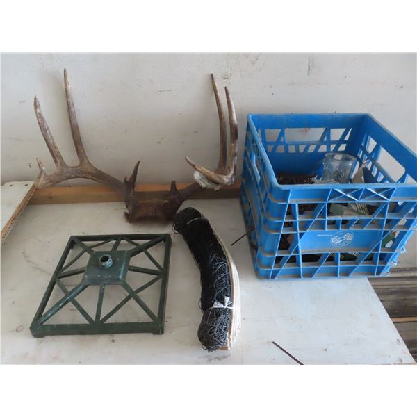 deer antlers with tag , net and misc.