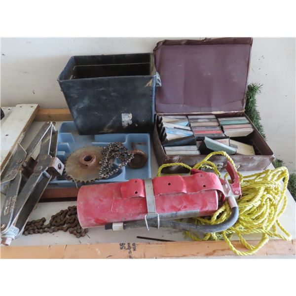 jack , fire extinguisher , cassette tapes , saw blades , rope