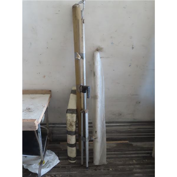 projector screen , roll of window wrap plastic , cutting board counter top roll