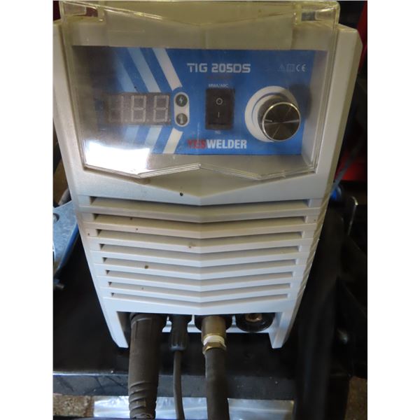 Yes welder tig welder on cart great shape