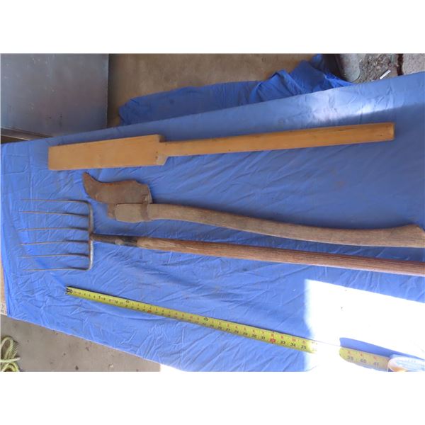 pitch fork , brush cutter , unique paddling stick