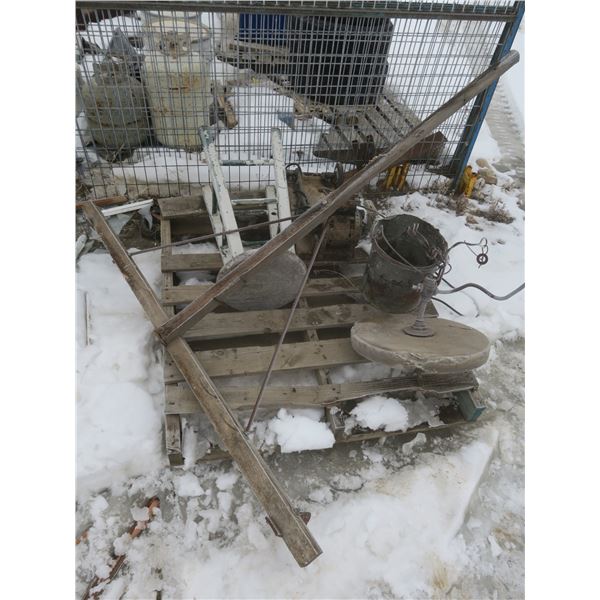 pallet with vintage grinding wheel, stool, hoe, etc.