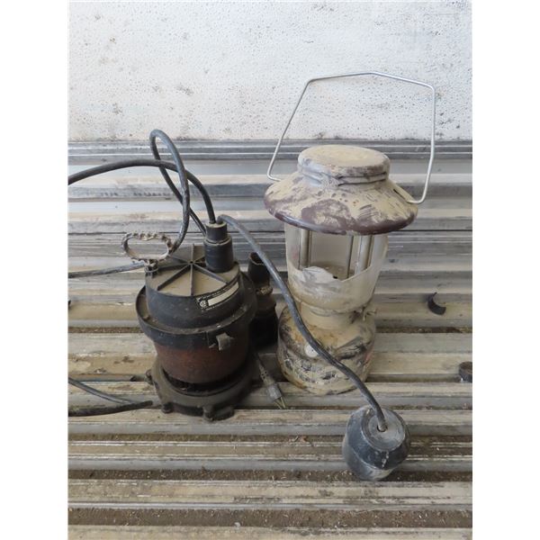 sump pump and Coleman lantern that needs new dome