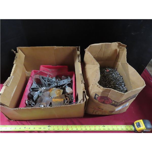 nearly full box of 1 1/4 " nails and bin of assorted hardware