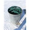 Image 2 : large galvanized barrel with garden hose