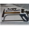 Image 3 : gray hacksaw , old tools and hatchet