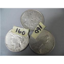 2 1922 Piece silver dollar and a 1921 Morgan Silver Dollar (2)