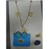 Image 1 : Ivory Necklace and Pendant with Scrimshawed flowers, blue clipon earrings and blue Markasite Ring (2