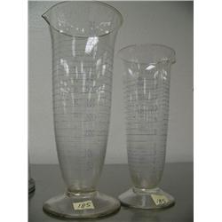 Lot of 2 graduated flasks- 9-1/2" & 11-1/2" tall (88)