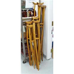 Lot of 7 pairs of old wooden crutches in various sizes (88)