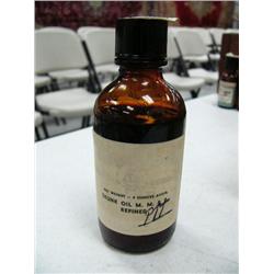 Old bottle of Skunk Oil refined (88)
