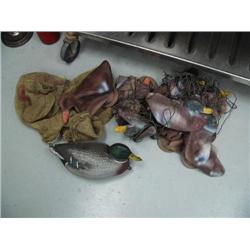 Lot of: old inflatable duck decoys, old potato sack, one floating duck decoy (88)