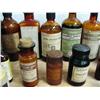 Image 12 : Lot of old medicinal bottles many with corks and screw tops some with original Seward Drug Store lab