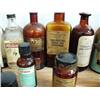 Image 7 : Lot of old medicinal bottles many with corks and screw tops some with original Seward Drug Store lab