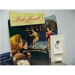 Old advertising pop up display for Bell & Howell; old 1919 calendar with picture of personified Amer