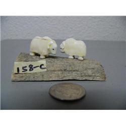 CHOICE on: 5 Ivory Musk ox by Robert Kokuluk mounted on old Whalebone (2)