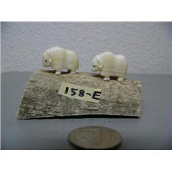 CHOICE on: 5 Ivory Musk ox by Robert Kokuluk mounted on old Whalebone (2)