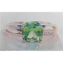 Peridot and Diamond Lady's Ring 14 K yellow gold- peridot is cushion shaped, faceted approx. 1.25 ca